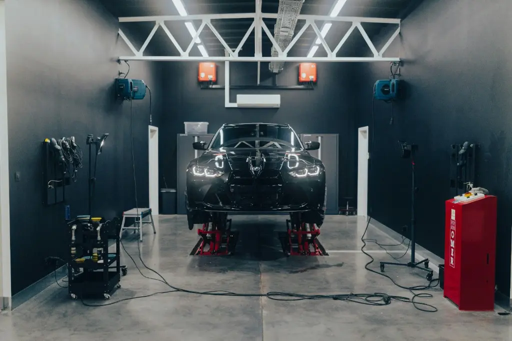 DIY garage bay with lift and equipment